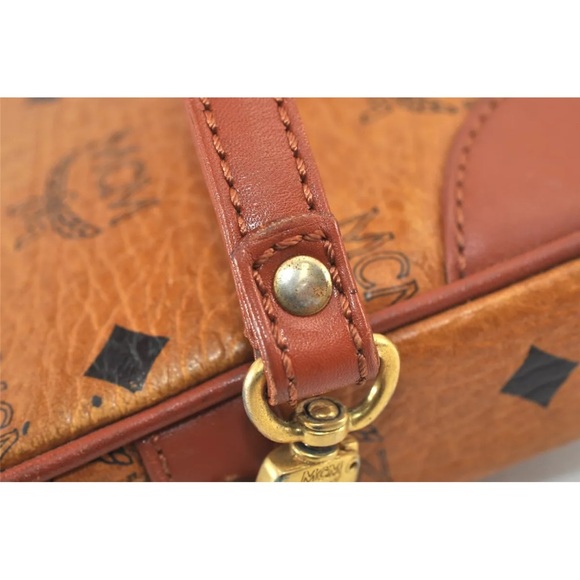 MCM Brown Clutch with Logo Pattern and Wrist Strap - Picture 9 of 16